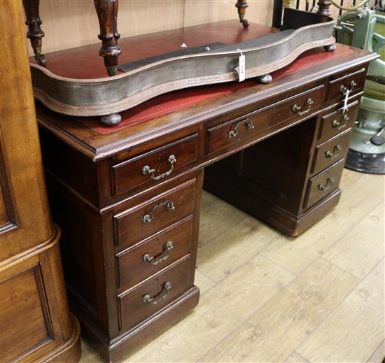 A mid 20th century mahogany pedestal desk W.138cm